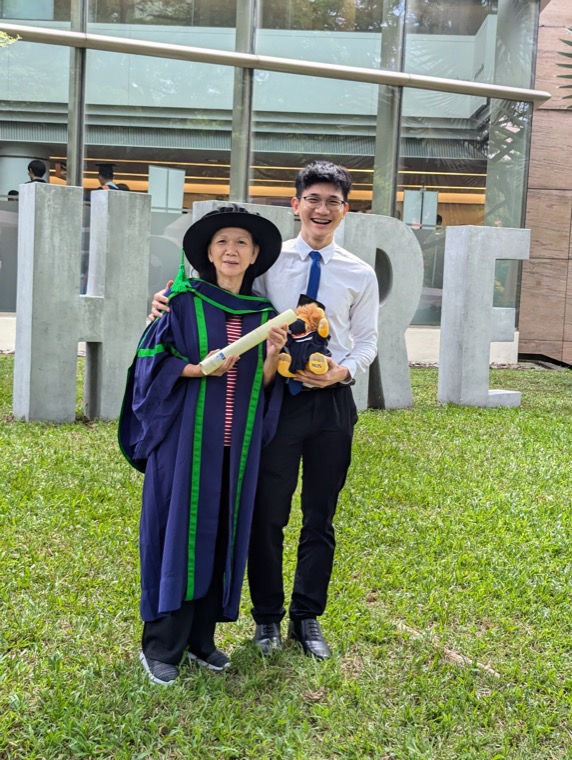 Thanh Lam at his PhD graduation with his mom
